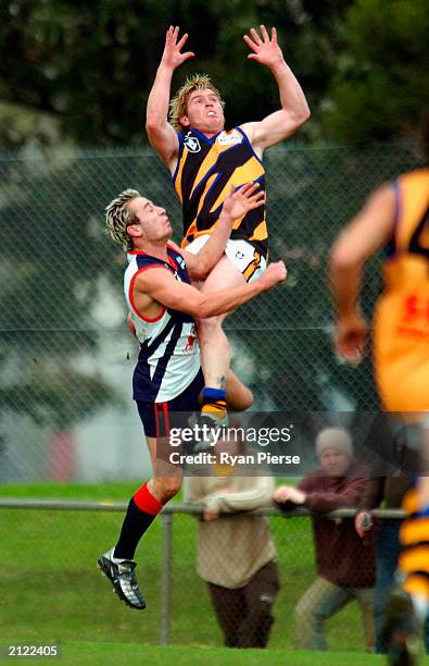 Gary Moorcroft for the Zebras flys for a mark over Beau Miller for the Scorpions during the VFL match between the Springvale Scorpions and the...