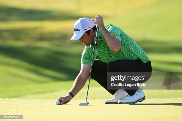 Davis Riley of the United States lines up a putt on the third green during the second round of the Texas Children's Houston Open at Memorial Park...