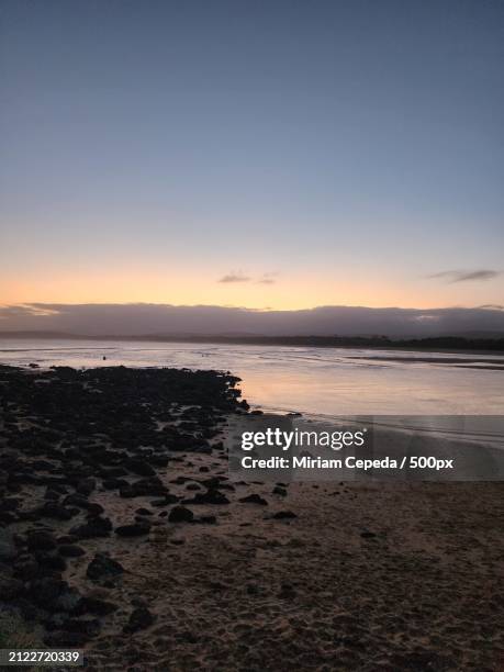 scenic view of sea against clear sky during sunset - there something about miriam stock pictures, royalty-free photos & images