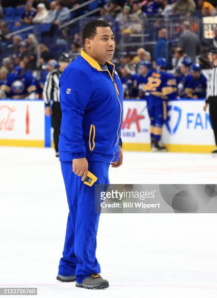 Member of the ice crew takes ice readings during an NHL game between the Buffalo Sabres and the Ottawa Senators on March 27, 2024 at KeyBank Center...