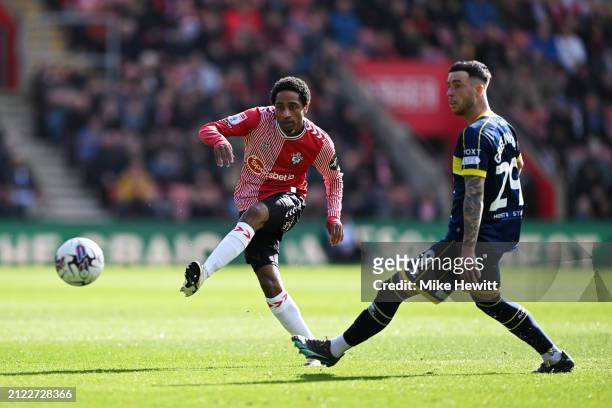 Kyle Walker-Peters of Southampton passes the ball whilst under pressure from Sam Greenwood of Middlesbrough during the Sky Bet Championship match...