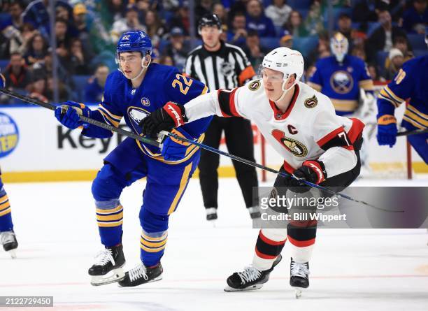 Jack Quinn of the Buffalo Sabres skates against Brady Tkachuk of the Ottawa Senators during an NHL game on March 27, 2024 at KeyBank Center in...