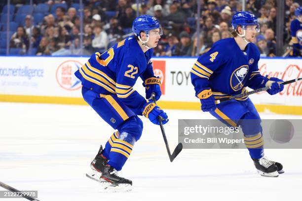 Jack Quinn and Bowen Byram of the Buffalo Sabres skate against the Ottawa Senators during an NHL game on March 27, 2024 at KeyBank Center in Buffalo,...