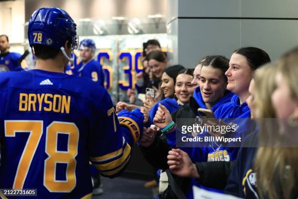 Fans cheer as Jacob Bryson of the Buffalo Sabres heads to the ice prior to an NHL game against the Ottawa Senators on March 27, 2024 at KeyBank...