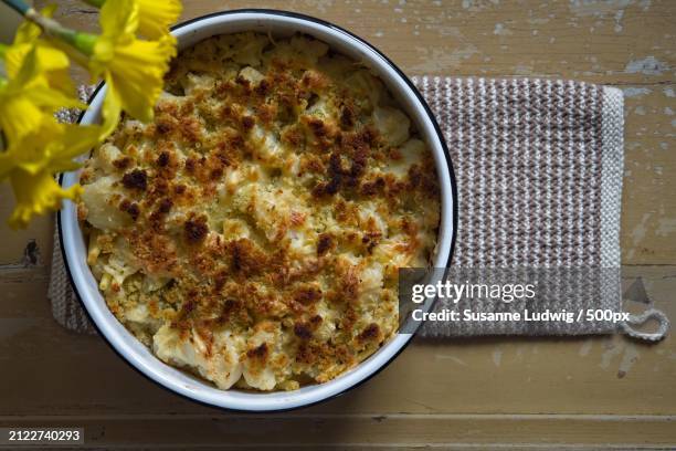 high angle view of food in bowl on table - cauliflower stock pictures, royalty-free photos & images