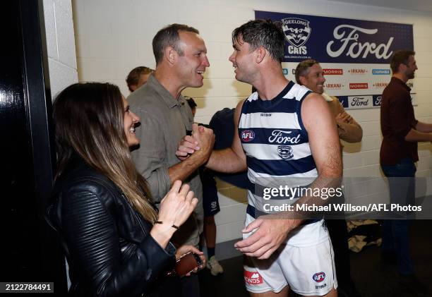 Tom Hawkins of the Cats is seen with Brad Ottens after his 350th match during the 2024 AFL Round 03 match between the Hawthorn Hawks and the Geelong...