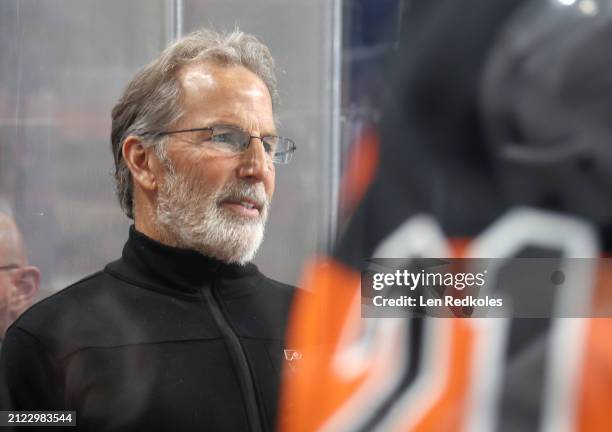 Head Coach of the Philadelphia Flyers John Tortorella watches the play on the ice during the first period against the Boston Bruins at the Wells...