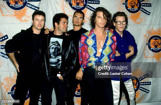 Australian musicians Garry Gary Beers, Andrew Farriss, Jon Farriss, Michael Hutchence and Kirk Pengilly, of the Australian rock band INXS, pose for a...