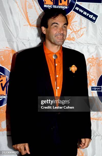 American film director Oliver Stone poses for a portrait backstage during the 1990 MTV Video Music Awards at the Universal Amphitheatre in Los...