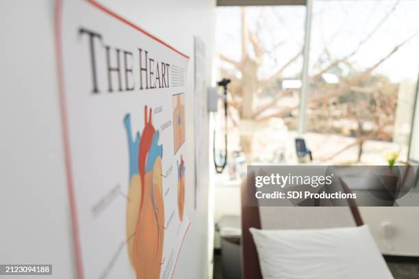 empty, clean cardiologist examination room ready for patient - medical supplies stock pictures, royalty-free photos & images