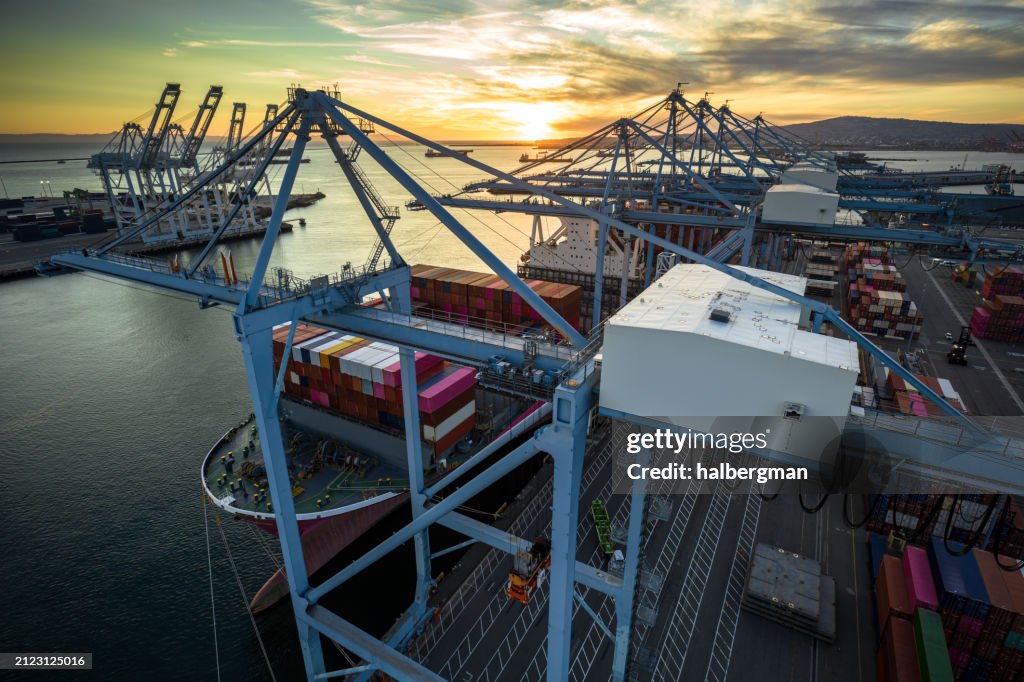 Aerial Shot of STS Crane Machinery House High Above Port of Long Beach at Sunset