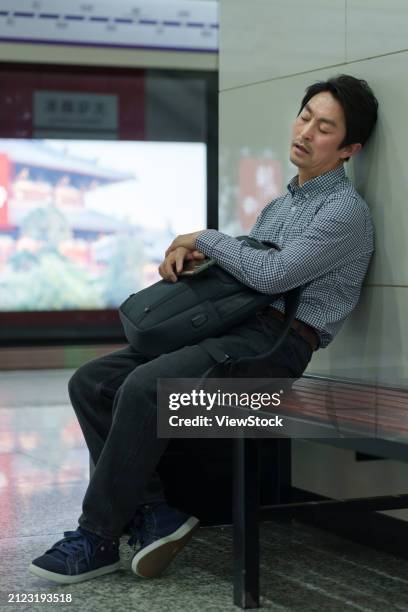 subway platform, middle-aged men - having trouble sleeping stock pictures, royalty-free photos & images