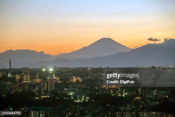 sunset silhouette of mount fuji from yokohama - fujin stock pictures, royalty-free photos & images