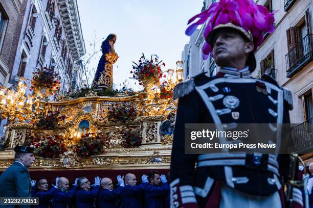 Several people carry the throne during the procession of the Christ of Medinaceli, on 29 March, 2024 in Madrid, Spain. This Good Friday procession is...
