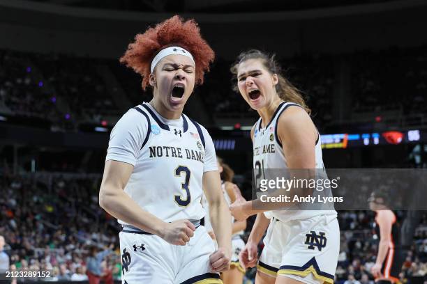 Hannah Hidalgo and Maddy Westbeld of the Notre Dame Fighting Irish react after a play against the Oregon State Beavers during the second half in the...