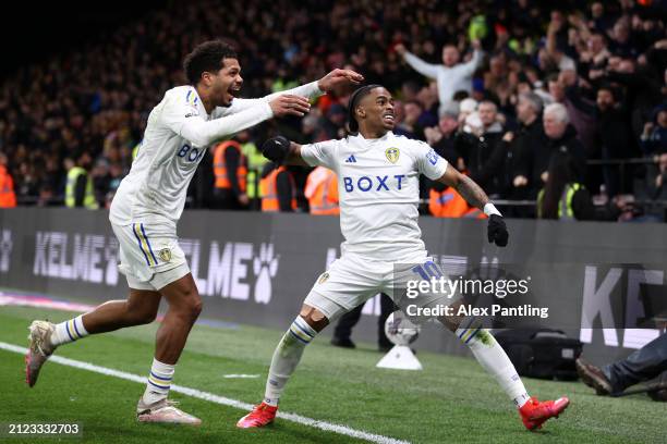 Crysencio Summerville of Leeds United celebrates scoring his team's first goal with Georginio Rutter during the Sky Bet Championship match between...