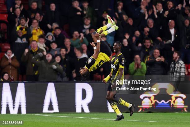 Emmanuel Dennis of Watford celebrates scoring his team's second goal during the Sky Bet Championship match between Watford and Leeds United at...