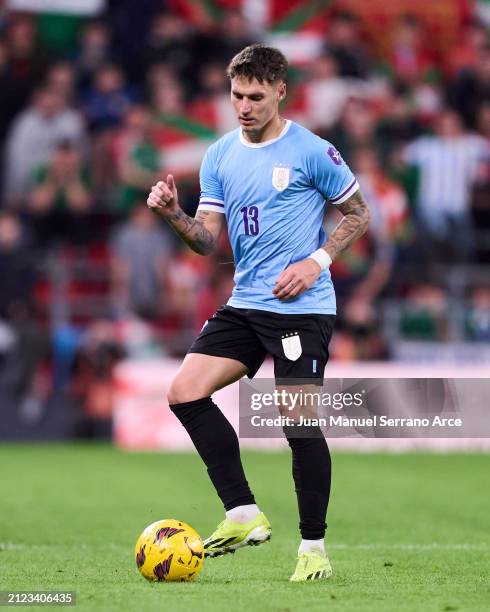 Guillermo Varela of Uruguay in action during the Friendly Match Pais Vasco v Uruguay at Estadio de San Mames on March 23, 2024 in Bilbao, Spain.