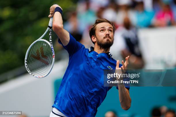 Daniil Medvedev of Russia hits a smash against Jannik Sinner of Italy in the semi-final of the Miami Open at the Hard Rock Stadium on March 29, 2024...