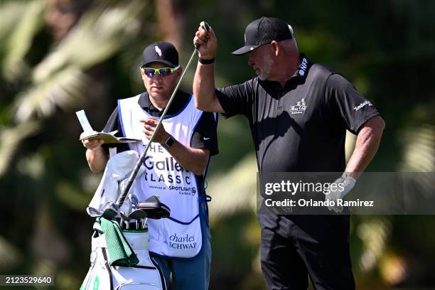 Darren Clarke of Northern Ireland selects a club from his bag on the fifth green during the first round of The Galleri Classic at Newport Beach...