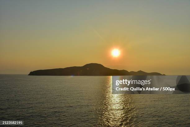 scenic view of sea against sky during sunset,el pireo,greece - transporte marítimo stock pictures, royalty-free photos & images