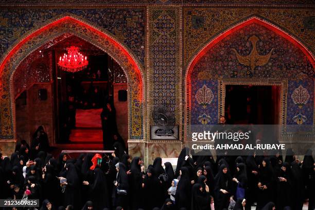 Muslim devotees gather to commemorate Laylat al-Qadr and the martyrdom of Imam Ali at the Imam Ali shrine in Najaf city on April 1 during Islam's...