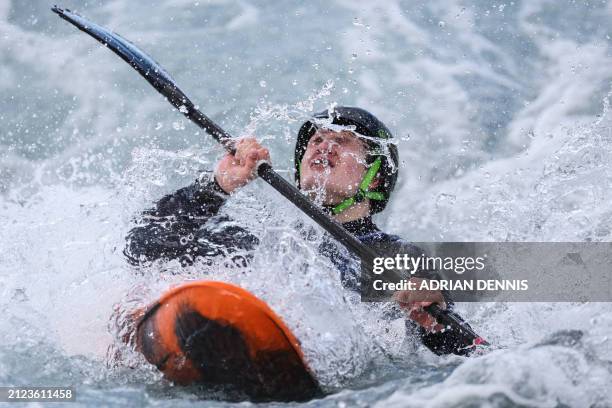 British Oscar Wyllie competes in the men's kayak cross junior time trial race during the Slalom & Kayak Cross Selection Series, at Lee Valley White...