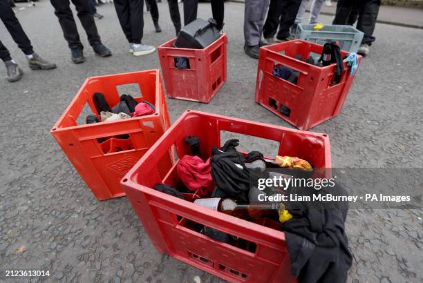 Crates of petrol bombs that are being carried by youths at the start of an Easter Monday parade in the Creggan area of Londonderry, commemorating the...