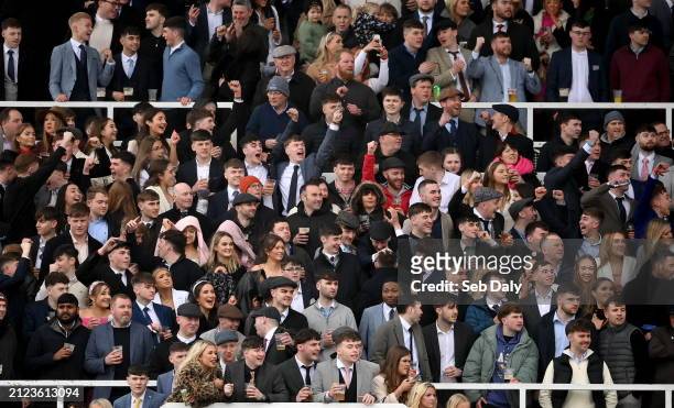Meath , Ireland - 1 April 2024; Racegoers celebrate after the Farmhouse Foods Novice Handicap Hurdle on day three of the Fairyhouse Easter Festival...