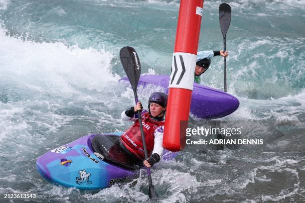 British Kimberly Woods competes in the women's kayak cross guest semi-final race during the Slalom & Kayak Cross Selection Series, at Lee Valley...