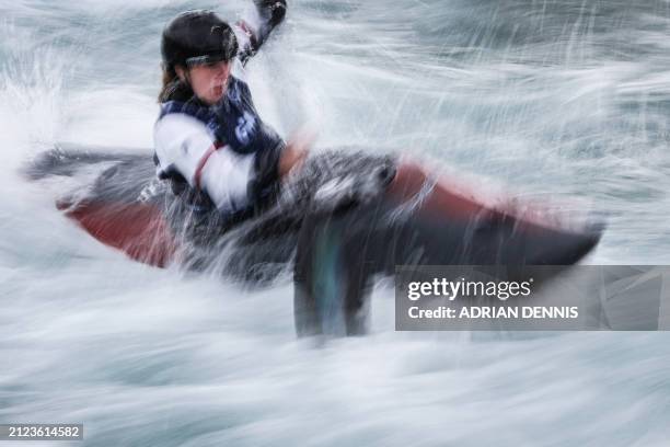 British Phoebe Spicer competes in the Women's kayak cross final race during the Slalom & Kayak Cross Selection Series, at Lee Valley White Water...