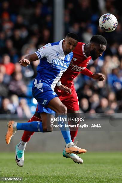 Chey Dunkley of Shrewsbury Town and Scott Sinclair of Bristol Rovers during the Sky Bet League One match between Bristol Rovers and Shrewsbury Town...