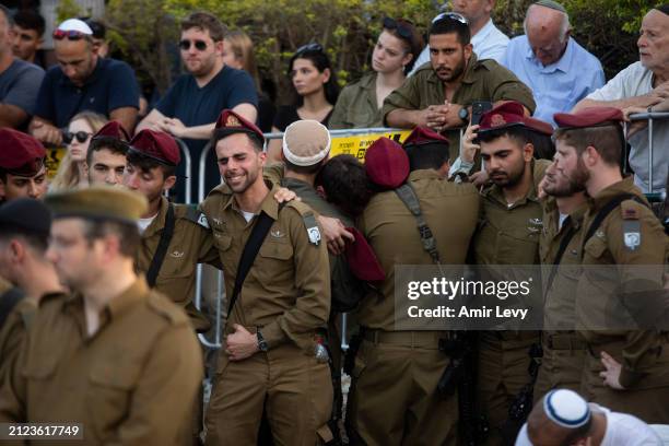 Soldiers mourn during a funeral of Israeli soldier Sergeant First Class Sivan Wail who was killed in the Gaza Strip on April 1, 2024 in Ra'anana,...