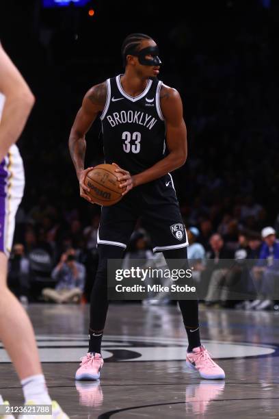 Nic Claxton of the Brooklyn Nets in action against the Los Angeles Lakers during the first half at Barclays Center on March 31, 2024 in New York...