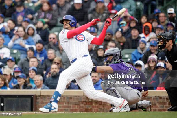 Christopher Morel of the Chicago Cubs singles in the first inning during the game between the Colorado Rockies and the Chicago Cubs at Wrigley Field...
