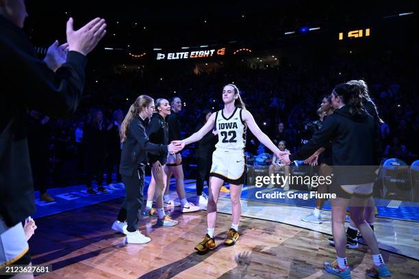 Caitlin Clark of the Iowa Hawkeyes is introduced during pregame ceremonies against the LSU Tigers during the Elite Eight round of the 2024 NCAA...