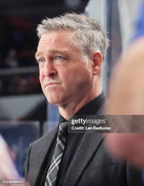 Head Coach of the New York Islanders Patrick Roy looks on from his bench during the first period against the Philadelphia Flyers at the Wells Fargo...