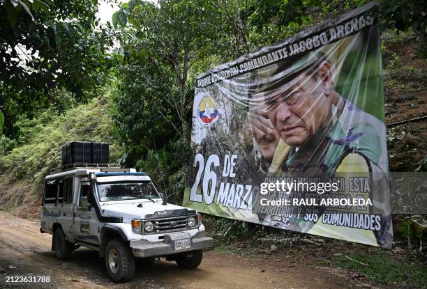 Banner depicting Revolutionary Armed Forces of Colombia late leader and founder Manuel Marulanda Velez is seen in Micay Canyon, a mountainous area...