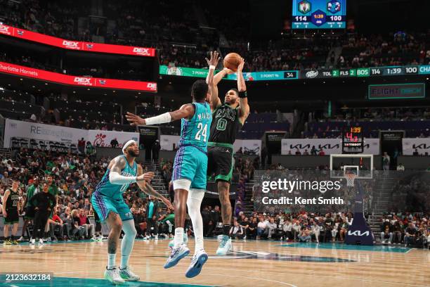 Jayson Tatum of the Boston Celtics shoots the ball during the game against the Charlotte Hornets on April 1, 2024 at Spectrum Center in Charlotte,...