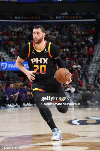 Jusuf Nurkic of the Phoenix Suns handles the ball during the game against the New Orleans Pelicans on April 1, 2024 at the Smoothie King Center in...