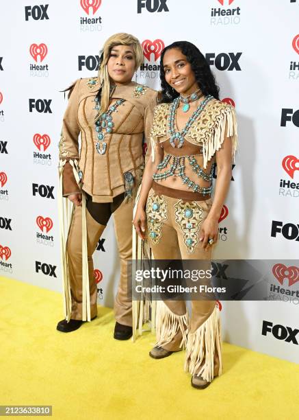 Tionne "T-Boz" Watkins and Rozonda "Chilli" Thomas of TLC, winners of iHeart Landmark award, pose in the press room at the 2024 iHeartRadio Music...