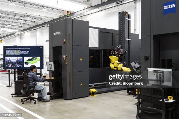 Production arm on the production line at the Volkswagen Anhui Automotive Co. Factory in Hefei, Anhui Province, China, on Thursday, March 28, 2024....