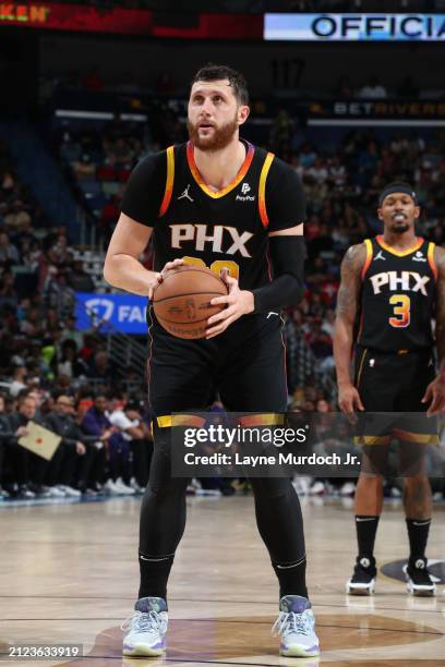 Jusuf Nurkic of the Phoenix Suns shoots a free throw during the game against the New Orleans Pelicans on April 1, 2024 at the Smoothie King Center in...