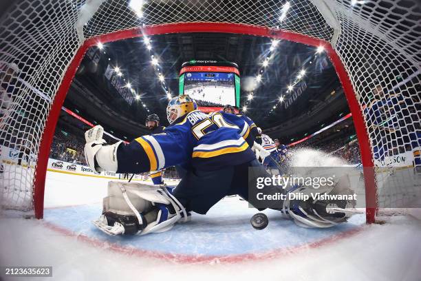 Jordan Binnington of the St. Louis Blues allows a goal against the Edmonton Oilers during the during the third period at Enterprise Center on April...