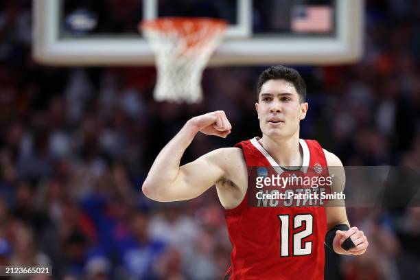 Michael O'Connell of the North Carolina State Wolfpack reacts after scoring against the Marquette Golden Eagles during the 1st half of the Sweet 16...