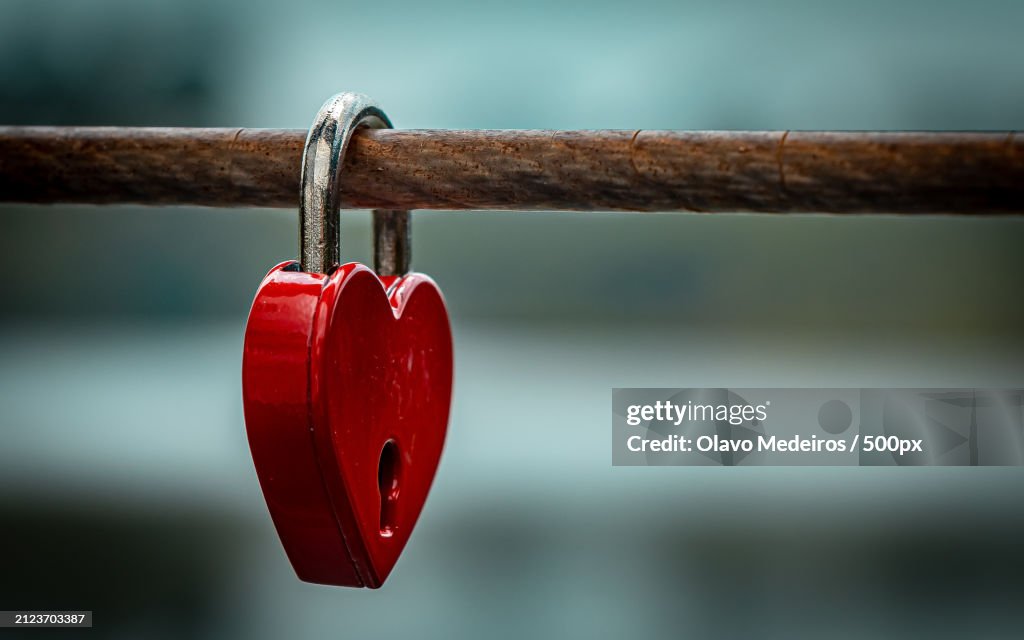 Close-up of padlock hanging on railing,Holambra,Brazil