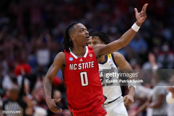 Horne of the North Carolina State Wolfpack reacts against the Marquette Golden Eagles during the second half in the Sweet 16 round of the NCAA Men's...