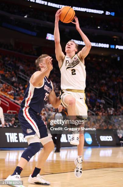 Fletcher Loyer of the Purdue Boilermakers drives to the basket against Ben Gregg of the Gonzaga Bulldogs during the second half in the Sweet 16 round...