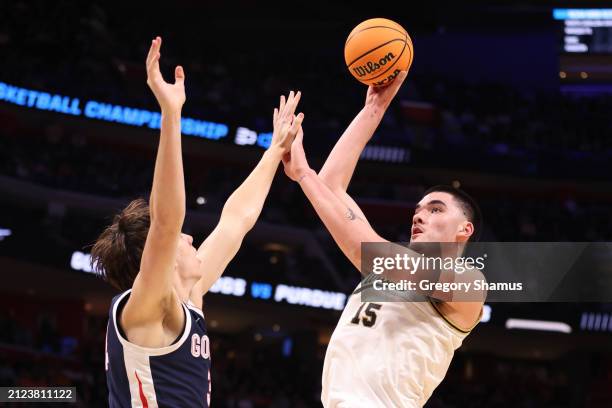 Zach Edey of the Purdue Boilermakers shoots the ball against Braden Huff of the Gonzaga Bulldogs during the second half in the Sweet 16 round of the...