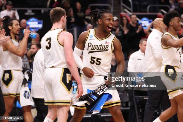 Lance Jones of the Purdue Boilermakers celebrates with teammates during the second half against the Gonzaga Bulldogs in the Sweet 16 round of the...
